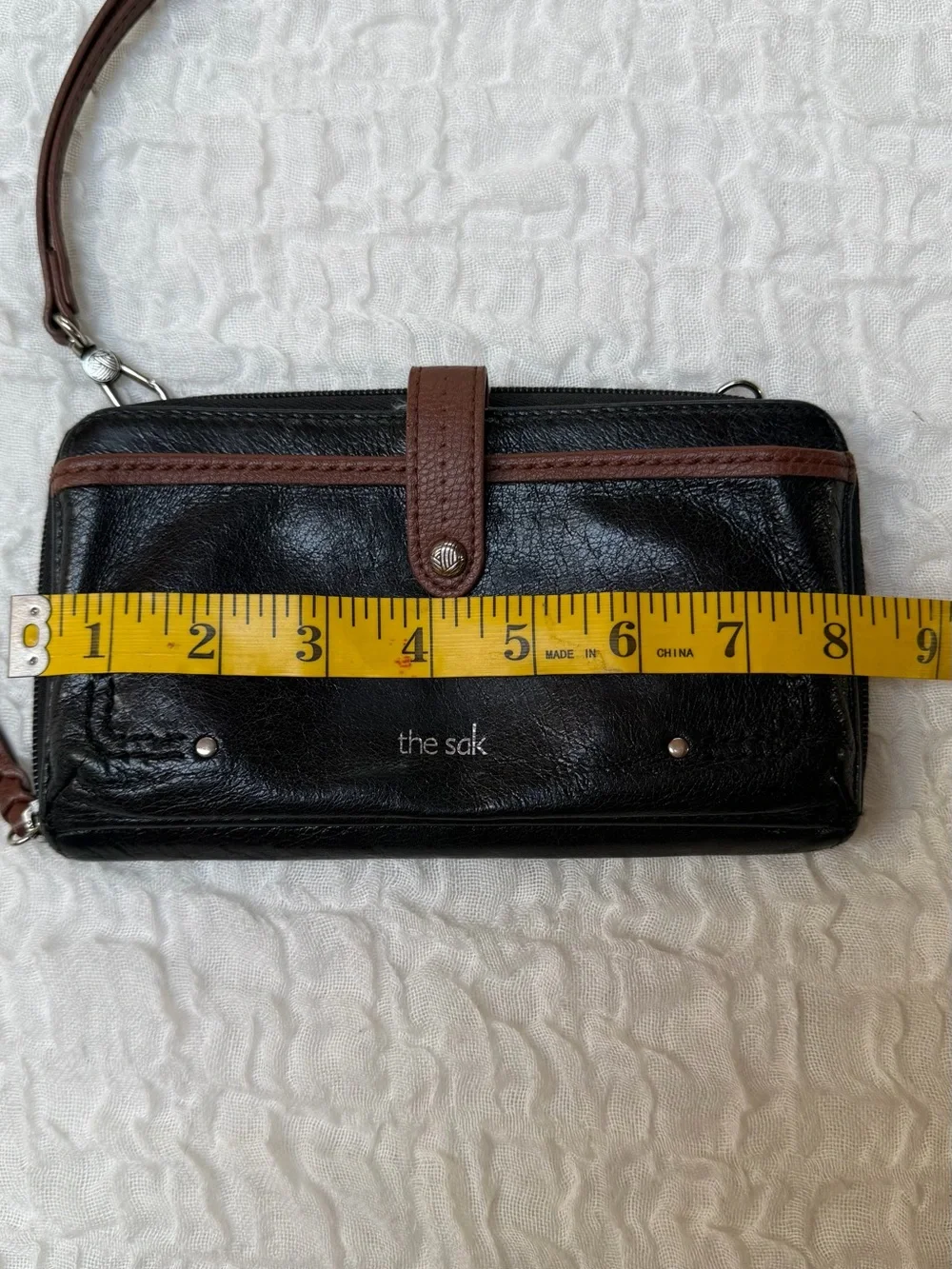 The Sak Smartphone Black and Brown Leather Wristlet